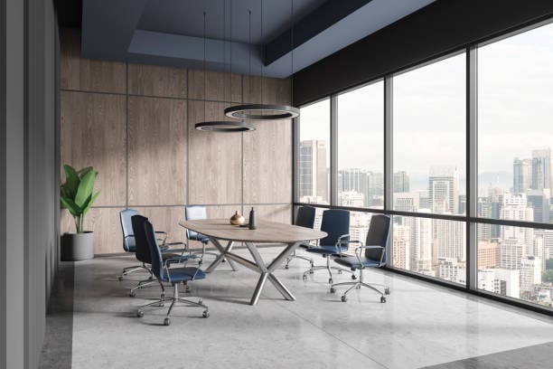 A conference room with chairs and tables in it